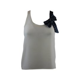Top de seda Maje con lazo de lentejuelas azul