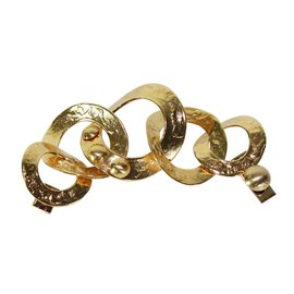 Bracciale Louis Vuitton in metallo dorato con grandi anelli