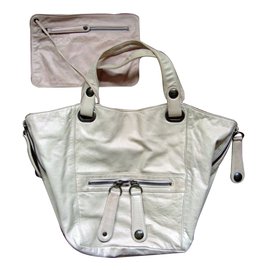 Gerard Darel Handtasche aus rosa Lammleder mit Etui