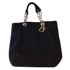 Bolsa Christian Dior em couro trançado preto