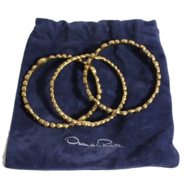 Set di 3 bracciali Oscar de la Renta in ottone dorato