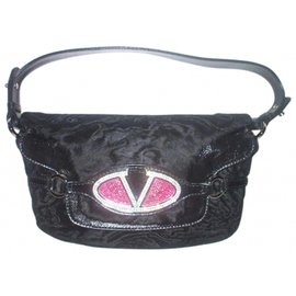 Sac de soirée Valentino Garavani en cuir noir et fourrure avec broche Swarovski