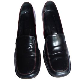 Mocassini Gucci in pelle nera con tacco medio