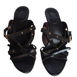 Gucci Mules aus Leder Braun