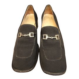 Mocasines Gucci negros de cuero y textil 38.5IT