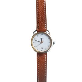 Montre Hermès Arceau plaqué or et acier avec bracelet en cuir