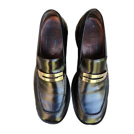 Mocassini Gucci in pelle nera con fibbia G