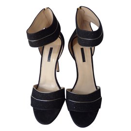 Elie Saab Pumps aus schwarz-gold irisierendem Leder