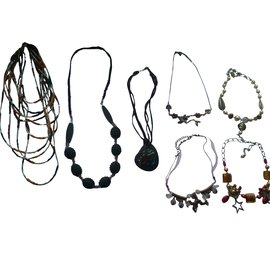 Set di 7 collane e 2 bracciali inconnue in acciaio