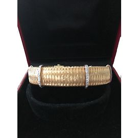Bracciale intrecciato in oro giallo e diamanti Roberto Coin