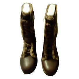 Botines Ugg de cuero chocolate
