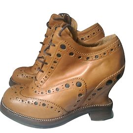 Botines de cuña Acne en cuero marrón camel