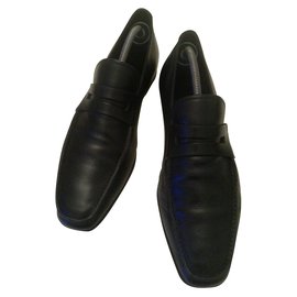 Mocassins Prada en cuir noir