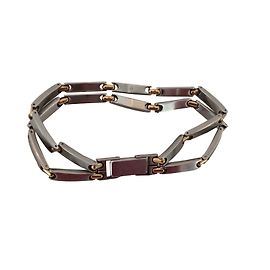 Autre Marque Bracciale Pequignet Moorea in acciaio e oro argentato