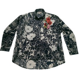 Blusa asimétrica Rene Derhy de algodón blanca y azul