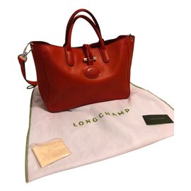Borsa a mano Longchamp Roseau Heritage in pelle corallo