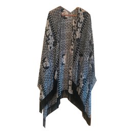 Poncho Maje estampado con flecos azul