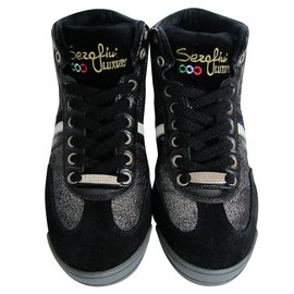 Zapatillas Serafini de piel gris metalizada