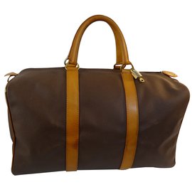 Borsa da viaggio Chanel in pelle granulata marrone