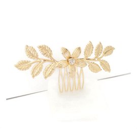 Autre Marque Pettine per chignon foglie e fiori placcato oro con cristallo