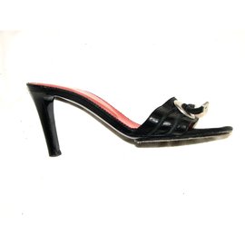 Mules en cuir Yves Saint Laurent Rive Gauche noires