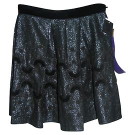 Anna Sui Tweet con falda de hilo metalizado.