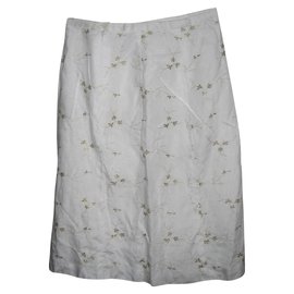 Falda Escada de lino blanca con bordado dorado