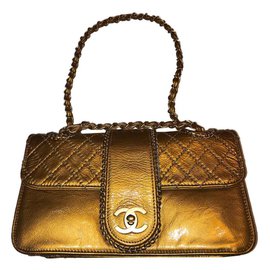 Borsa Chanel in pelle oro giallo