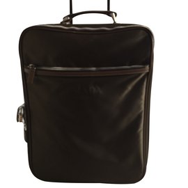 Bolso de viaje Prada bronce de tela