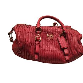 Borsa Coach in pelle color corallo