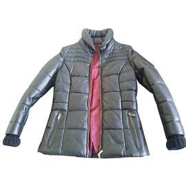 Autre Marque Chaqueta de piel de cordero negra con mangas de punto de lana