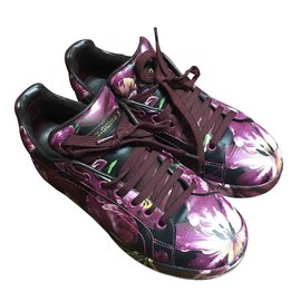 Dolce & Gabbana Sneakers aus schwarzem Leder mit Blumenprint