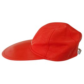Courreges Cappellino Courrèges arancione in vinile