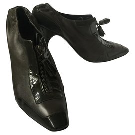 Stiefeletten aus Leder und Lack - Céline