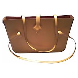 Borsa a mano Hermès in pelle martellata gialla