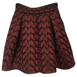 Falda midi de encaje Maje negra roja