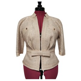 Chaqueta Louis Vuitton de seda rosa con botones dorados