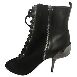 Giuseppe Zanotti Botas con cremallera y cordones