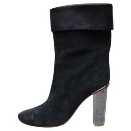 Stivaletti Chloé in pelle nera con tacco trasparente