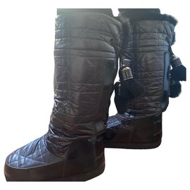 Dior Moon Stiefel aus schwarzem Lackleder