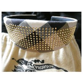Ribattini dorati Burberry Prorsum