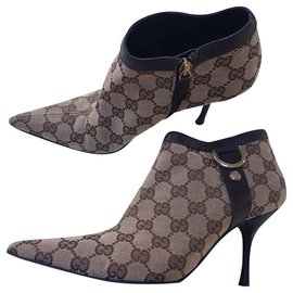 Botas Gucci GG Monogram de cuero marrón beige