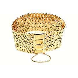 Autre Marque Bracciale manchette in oro giallo a maglia tessuta 18 carati