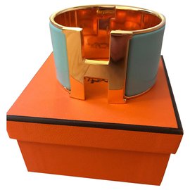 Hermès Clic H bracelet Lagoon blue and gold color