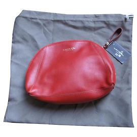 Lancel Sienna leather clutch.
