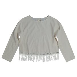 Blusa Nanushka de algodão bege com borlas