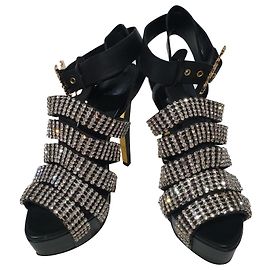 Tacchi Anna Dello Russo pour H & M in pelle nero argento