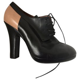 Stivaletti stringati Dries Van Noten in pelle nero e carne 37
