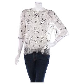 Blusa in pizzo Ganni avorio e viola