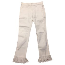 Chloé jeans bianchi in denim con frange